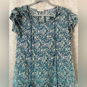 Solitaire floral pattern ruffle short sleeve blouse with tassels